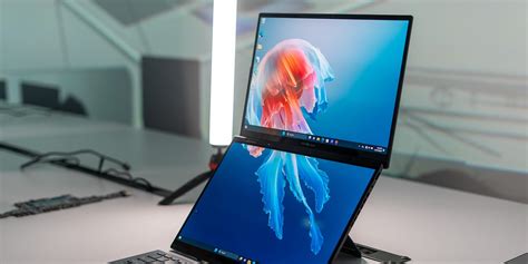 Dual Screen Laptop 的图像结果