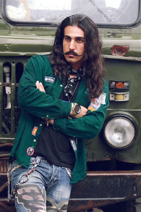 Download Long-Haired Male Pose Wallpaper | Wallpapers.com