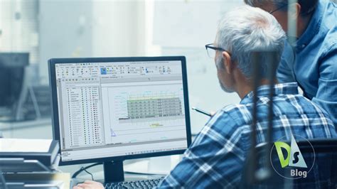 Two Senior Architectural Engineers Working With Building Bluepri ...