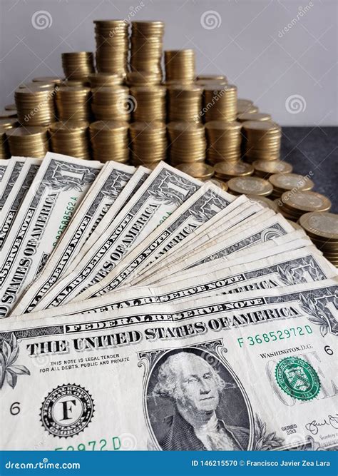 Approach To American Dollars Bills and Mexican Coins of Ten Pesos Stock ...