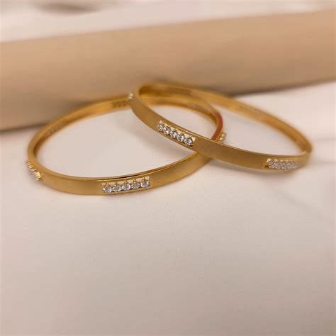 Buy Kelly Dazzle Diamond Bangles 18 KT yellow gold (32.5 gm). | Online ...