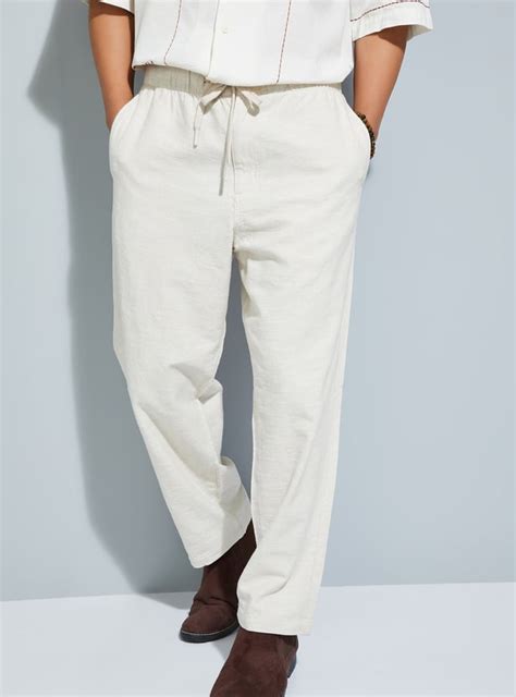 Buy URB_N Men Textured Comfort Fit Trousers Online at just Rs. 1299.0 ...