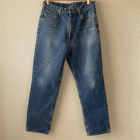 Carhartt men's flannel lined jeans Size 34x34.... - Depop