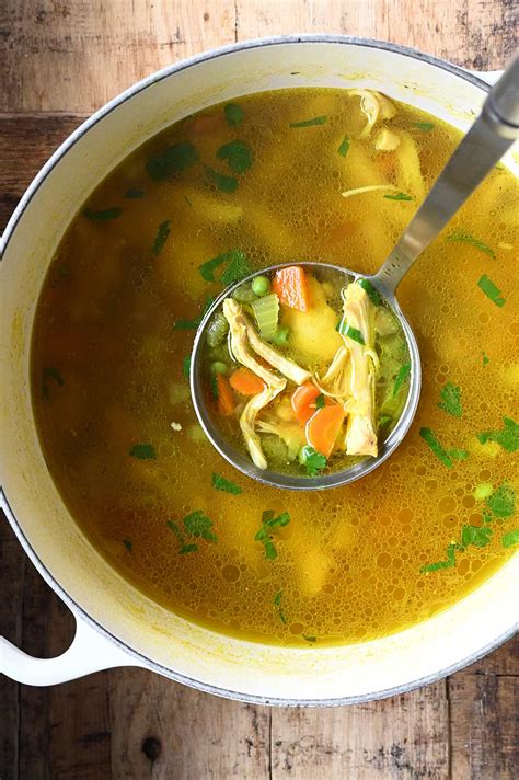 Turmeric Chicken Soup - Serving Dumplings