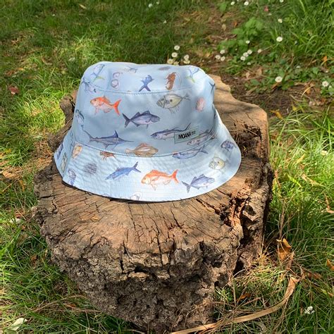 Fishes of NZ bucket hat made from 100% recycled polyester.