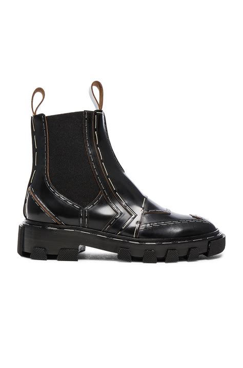 Balenciaga Shiny Leather Chelsea Boots in Black | FWRD