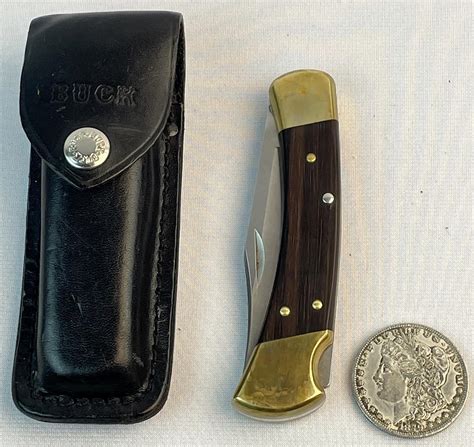 Lot - Vintage Buck 110 Folding Hunter Wooden Pocket Knife w/ Leather Sheath