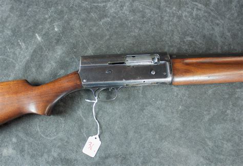At Auction: REMINGTON MODEL 11 SEMI AUTOMATIC SHOTGUN