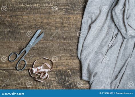 Antique Tailor Scissors, Textile and a Tape Measure on Wooden ...