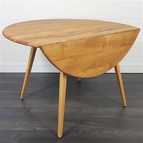 Round Drop Leaf Dining Table With Extra Leaves at Dominic Nanya blog