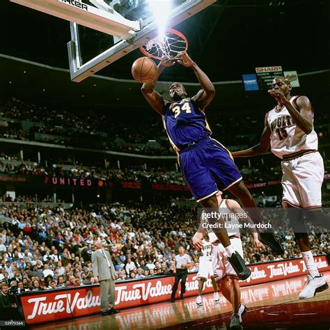 Shaquille O'Neal of the Los Angeles Lakers goes up for a slam dunk ...