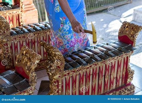 Woman Hands and Traditional Balinese Music Instrument Gamelan. Bali ...