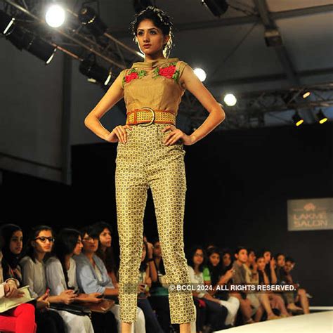 A model showcases a creation by designer Archana Rao on Day 5 of the ...