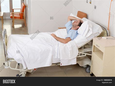 Sick Hospital Patient In Bed