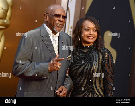 Louis Gossett, Jr., left, and Cyndi James Gossett arrive at the Oscars ...