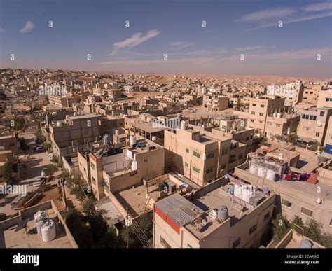 Rooftop water tanks are a common sight in the arid, sprawling city of ...