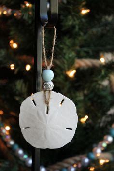 67 Sand dollar ideas | seashell crafts, sand dollar ornament, shell crafts