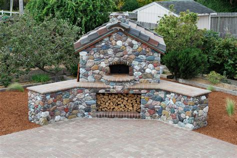 https://st.hzcdn.com/simgs/pictures/patios/outdoor-gable-roof-wood-fired-pizza-ovens-mugnaini-img~64112a1e01e99544_9-4408-1-c18acd2.jpg