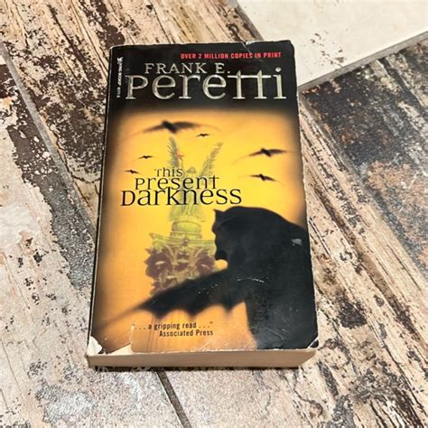 This Present Darkness by Frank E. Peretti , Paperback | Pangobooks