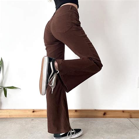 I’m 2000s brown flare pants Cute mid rise fit.... - Depop