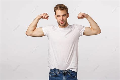 Fit Blond Man Bragging With Flexed Biceps On White Background Photo And ...