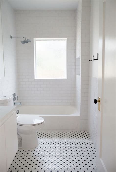 Pin by Angie Baum Leisring on Bathrooms in 2025 | White bathroom tiles ...
