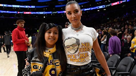 North West is so grown up as she poses alongside Mariah Carey's ...