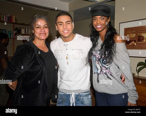 Quincy Brown (c) and mother Kim Porter (r) on set of Quincy Brown Stay ...