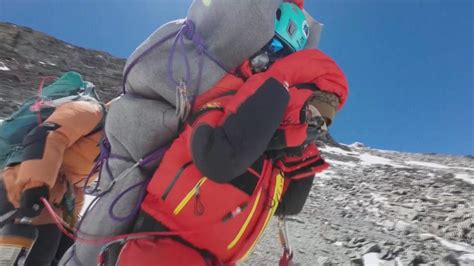 Sherpa carries Malaysian climber to safety in 'very rare' high-altitude ...
