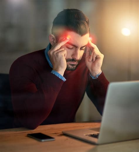 Businessman laptop and smartphone with headache for overwork remote job ...