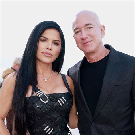 Lauren Sanchez dazzles in $2,200 gown as she and Jeff Bezos lead the glamorous arrivals at Joe ...