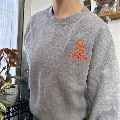 plain syracuse university sweatshirt no stains or... - Depop