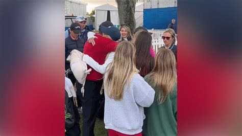 Tiger Woods and ex-wife share embrace after he and son take 2nd place ...