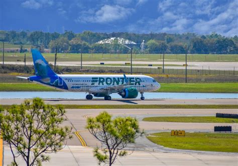 Frontier Aircraft on Runway Preparing for Departure from the Orlando ...