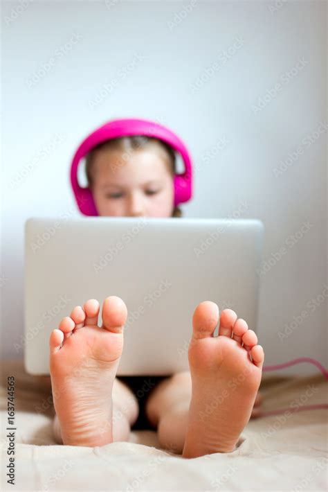 Barefoot Child Using Computer 的图像结果