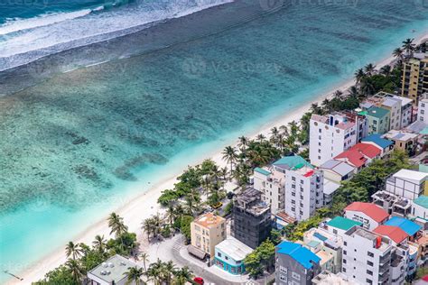 Male City, Maldives. Maldivian capital and local island from above. Hulhumale island with houses ...