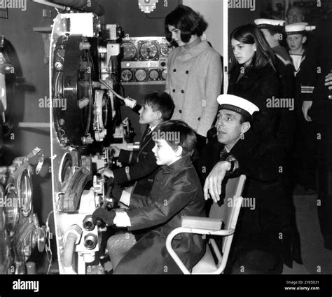 London ; Comedian Eric Sykes ( right ) superintends as children take ...