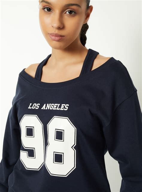 Buy Women Printed Drop Shoulder Sweatshirt Online at just Rs. 899.0 ...