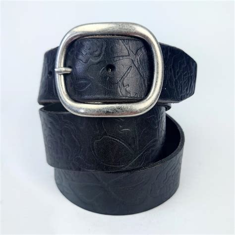Women's vintage embossed black leather belt from... - Depop