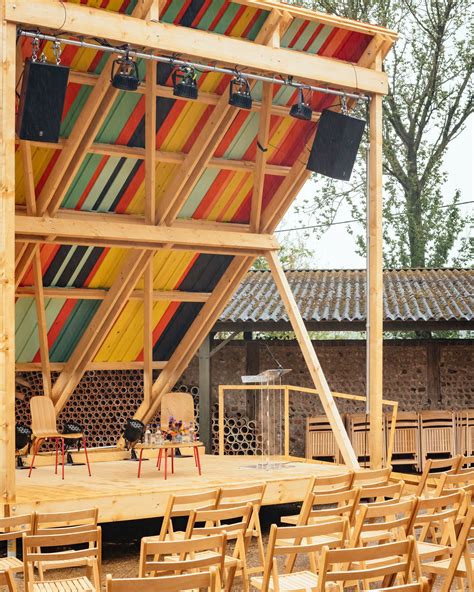 Colourful outdoor stage appears in the Charleston countryside | Outdoor stage, Architect ...