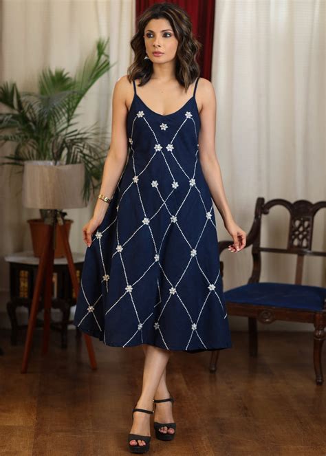 Navy blue strap dress with all over embroidery and pearl embellishment ...