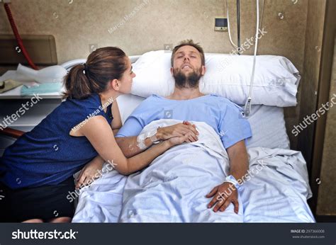 Sick Person In Hospital Bed