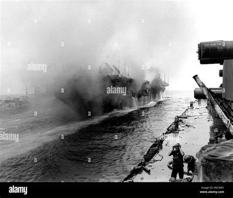 USS Bunker Hill (CV-17) burning 11 May 1945 aft view Stock Photo - Alamy