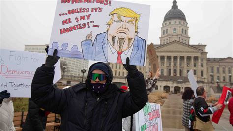 Anti-Trump protestors march at Kansas Statehouse to reject Project 2025