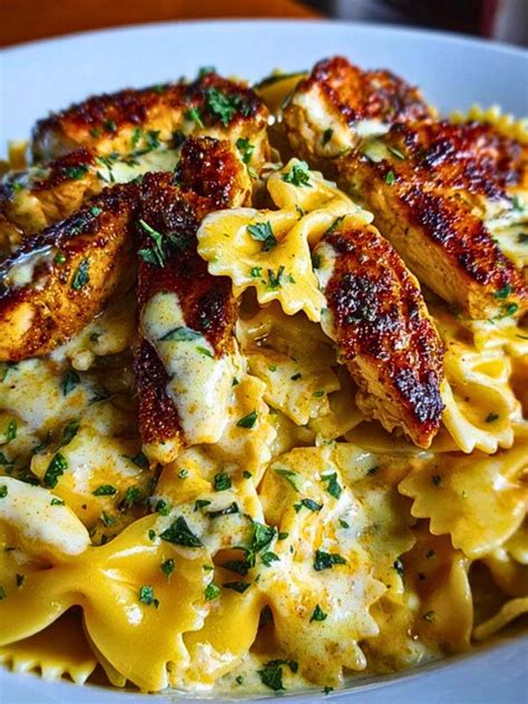 Creamy Cajun Chicken Bowtie Pasta with Garlic Cheese Sauce