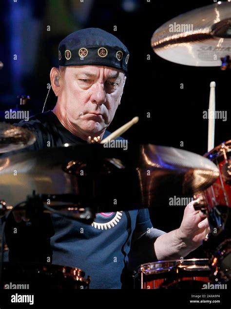 Rush drummer Neil Peart performs with the rest of the band at the BB&T ...