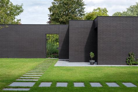Modern Brick House With Black Windows at Virginia Morgan blog