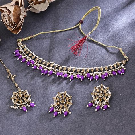 Sukkhi Glorious Gold Plated Reverse AD & Pearl Purple Necklace Set for
