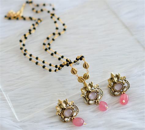 Antique black karimani chain with cz white -baby pink ganesha victoria ...