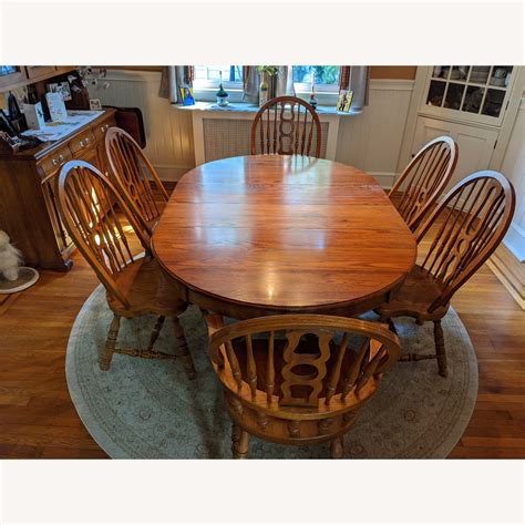 Vintage Oak Dining Room Table & 6 Oak Chairs - AptDeco